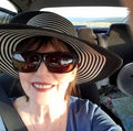 Suzan M.